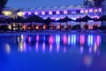 Hotel pool reflecting at night Royalty Free Stock Photo