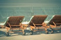 Hotel Poolside Chairs with Sea view Royalty Free Stock Photo