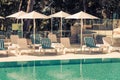 Hotel Poolside Chairs with Sea view Royalty Free Stock Photo