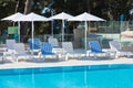 Hotel Poolside Chairs with Sea view Royalty Free Stock Photo