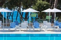 Hotel Poolside Chairs with Sea view Royalty Free Stock Photo