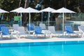 Hotel Poolside Chairs with Sea view Royalty Free Stock Photo