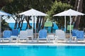 Hotel Poolside Chairs with Sea view Royalty Free Stock Photo