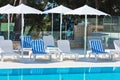 Hotel Poolside Chairs with Sea view Royalty Free Stock Photo