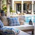 Hotel poolside lounge are with sofa with oriental Arabic or Turkish ornaments pillows and plaid