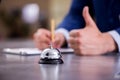 Hotel reception bell at the counter Royalty Free Stock Photo