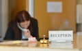 Hotel reception desk with bell Royalty Free Stock Photo