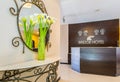 The hotel reception with desk and clocks