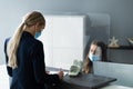 Hotel Reception Desk Protected By Medical Mask Royalty Free Stock Photo