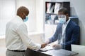 Hotel Reception Desk Protected By Medical Mask From Covid 19 Royalty Free Stock Photo