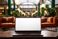Hotel reception mockup Laptop in lounge area, blank copyspace screen Royalty Free Stock Photo