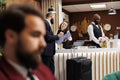 Hotel receptionist doing check in Royalty Free Stock Photo