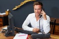 Hotel Receptionist Working At Computer Royalty Free Stock Photo