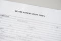 Hotel reservation form. Hotel service. Reception desk, registration. Close up. Selective focus. Royalty Free Stock Photo