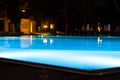 Hotel and resort swimming pool at night Royalty Free Stock Photo