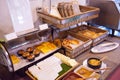 Hotel restaurant catering service healthy morning meal, American breakfast food buffet arrangement with Bakery Assortment in bambo