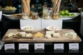 Hotel restaurant table with various types of cheese. Buffet catering service Royalty Free Stock Photo