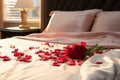 Hotel romance Bed adorned with rose petals creating a romantic setting