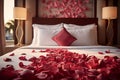 Hotel romance Bed adorned with rose petals creating a romantic setting