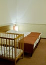 Hotel room with baby cot Royalty Free Stock Photo