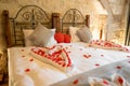 Hotel room for a couple in love with hearts. Royalty Free Stock Photo
