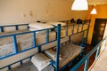 Hotel room with empty bunk beds in a small room Royalty Free Stock Photo