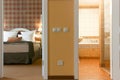 Hotel room - look to bedroom and bathroom. Royalty Free Stock Photo