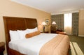 Hotel room with queen bed Royalty Free Stock Photo