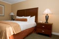 Hotel room with queen bed Royalty Free Stock Photo