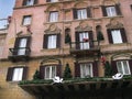 Hotel with Santas climbing up it at the top of the Spanish Steps in Rome Italy Royalty Free Stock Photo