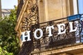 Hotel Sign on Balcony in Paris, France in Summertime Royalty Free Stock Photo