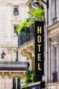 Hotel sign on facade of a building. Paris, France Royalty Free Stock Photo
