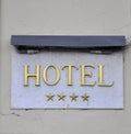 Hotel sign: four star hotel in Italy Royalty Free Stock Photo