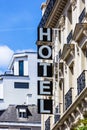 Hotel sign on facade of a building. Paris, France Royalty Free Stock Photo