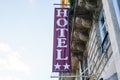Hotel sign text two stars in wall building facade in french tourist city