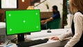 Hotel staff working with pc greenscreen Royalty Free Stock Photo