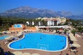 Hotel and swimming pool on a mountain background. Kemer. Turkey Royalty Free Stock Photo
