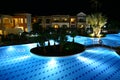 Hotel swimming pool by night Royalty Free Stock Photo