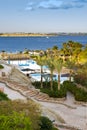 Hotel swimming pool by ocean Royalty Free Stock Photo