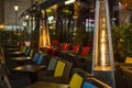 Hotel outside terrace heated with gas heaters Royalty Free Stock Photo
