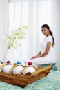 Hotel toiletries, woman sitting in the background Royalty Free Stock Photo