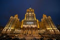 Hotel Ukraine Radisson Collection illuminated facade at night