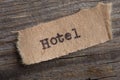 hotel word on a piece of paper close up
