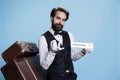 Hotel worker holds restaurant sign