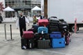 Hotel worker loading luggage into the truck in Vancouver, Canada