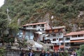 Hotels, buildings, steel sheet marketplace, and Peruvians in Aguas Calientes, Cusco Region, Peru Royalty Free Stock Photo