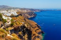 Hotels of Fira town on slopes of volcanic mountain overlooking the sea and Caldera of Santorini, Greece. Royalty Free Stock Photo