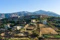 Hotels on a hillside in the village Mononaftis. Royalty Free Stock Photo