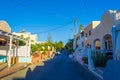 Traditional Cycladic architecture Kamari village Santorini street view Greece Royalty Free Stock Photo