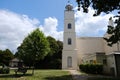 Hotham Park Clock Tower and Park Bench in Bright Summer Sunlight, Bognor Regis Royalty Free Stock Photo